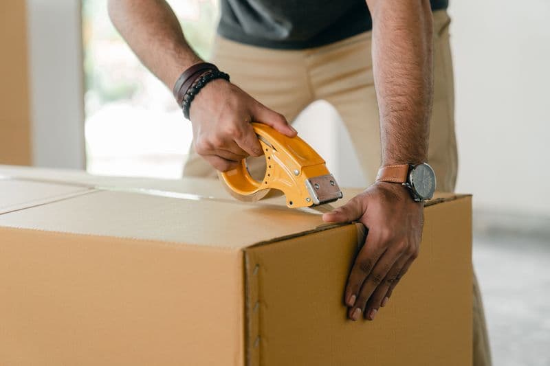 Partner packing goods for a local trip